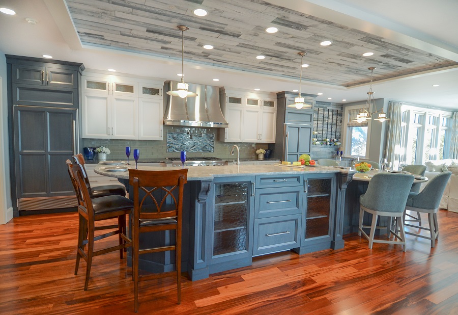 This transitional kitchen combines beach elements with white cabinets.