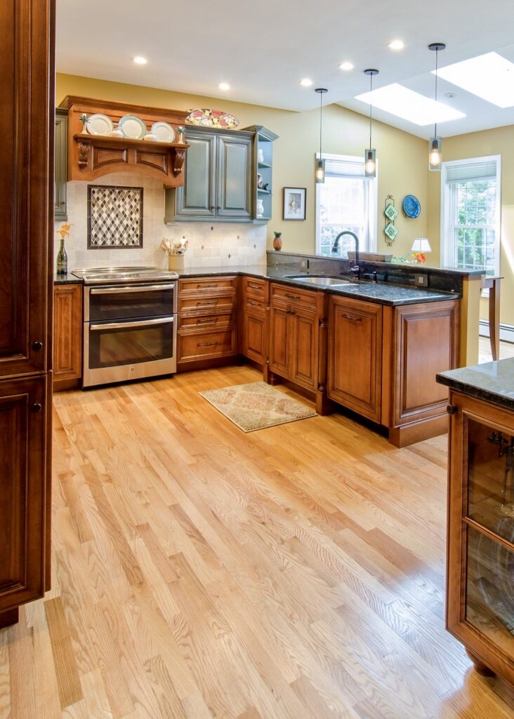 Deep wood tones create a relaxed atmosphere in this ornate kitchen.