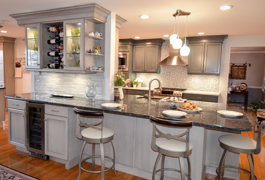 This Dream Kitchen Island combines a wine rack, glass cabinets and a beverage cooler! 