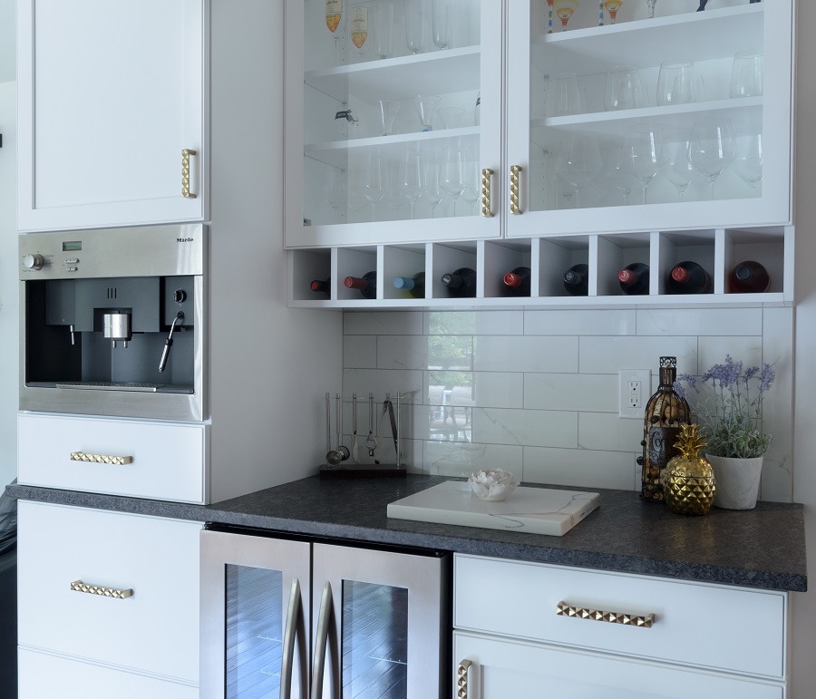 Accessories include a horizontal wine rack, glass cabinets, a beverage cooler and a built-in microwave.