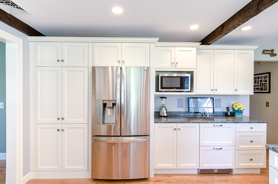 Good kitchen designs will add more storage space! We created a brand new pantry out of a bare wall.