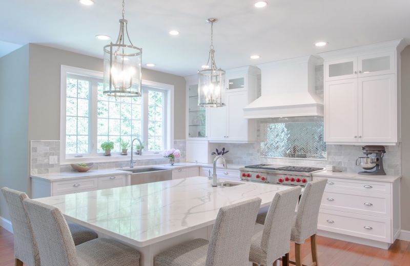 White countertops and white cabinets make this kitchen island feel so dreamy. 