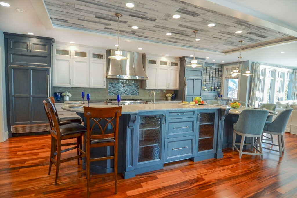Glass cabinets in this kitchen island are the perfect place to show off your prized possessions! 